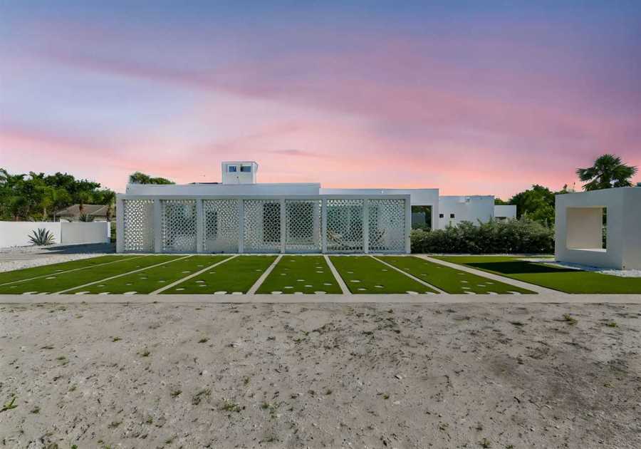 An Archetypal Sarasota School Home Nestled in Siesta Key Asks $3.3M
