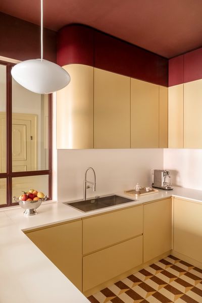 30 Years Later, They Reimagined Their Rome Apartment With a Glassy Central Kitchen