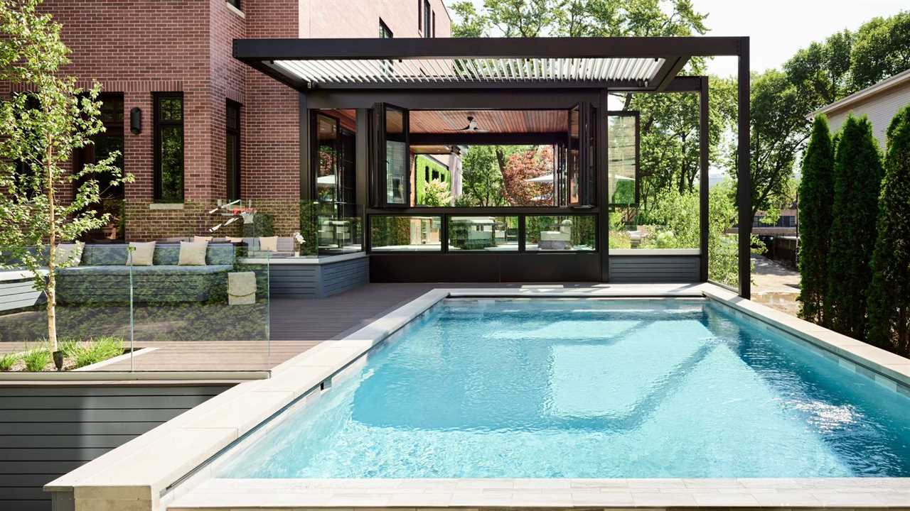This $7.7M Classic Chicago Home Made of Limestone and Brick Hides a Striking Sunroom