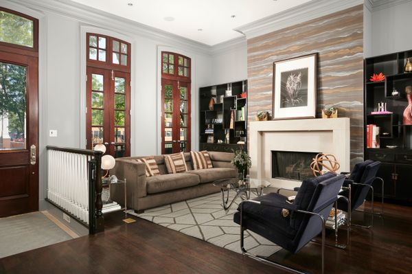 This $7.7M Classic Chicago Home Made of Limestone and Brick Hides a Striking Sunroom