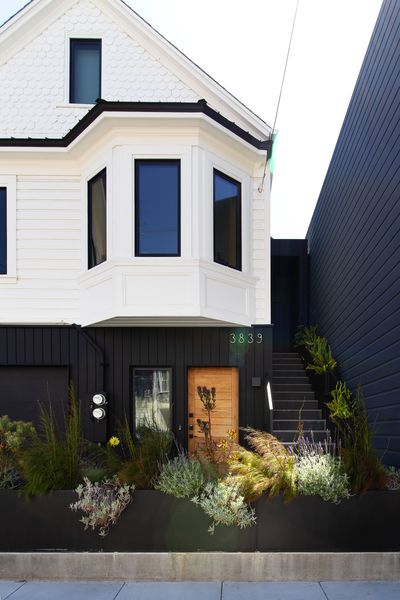 Kevin kept the Victorian details on the upper portion of the building, painted Benjamin Moore "Mayonnaise,