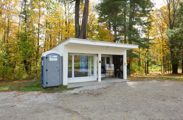 The Gropius House in Massachusetts currently has a port-a-potty adjacent to the visitors center. It recently ran a design contest