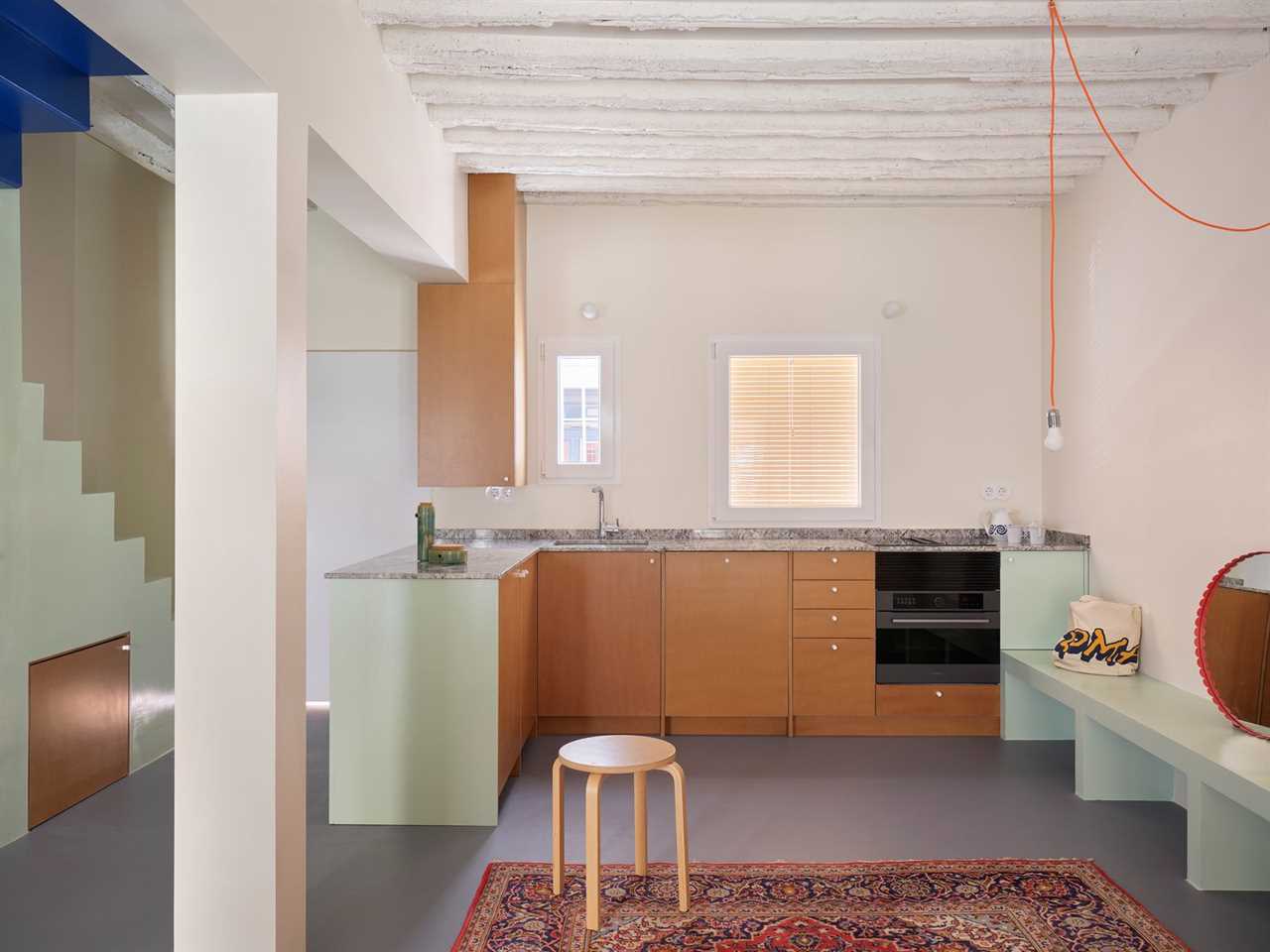 The Yellow Steel Prop in This Stripped-Back Madrid Townhome Made Us Do a Double Take