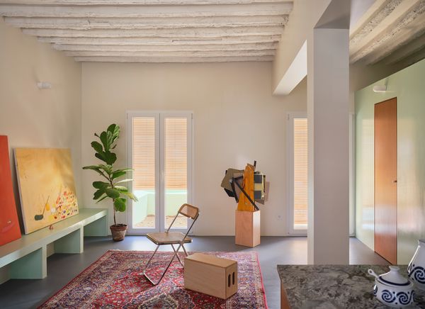 The Yellow Steel Prop in This Stripped-Back Madrid Townhome Made Us Do a Double Take