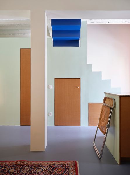 The Yellow Steel Prop in This Stripped-Back Madrid Townhome Made Us Do a Double Take