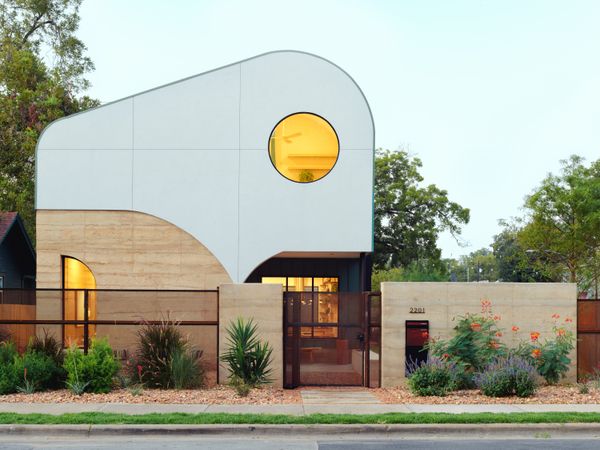 Austin-based Davey McEathron designed a rammed earth house in the city's Holly neighborhood with the backing of developer Kevin Yang and builder Rabb Construction.