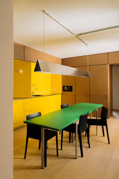 A Pink Stair Punctuates a Family’s Renovated 720-Square-Foot Madrid Apartment