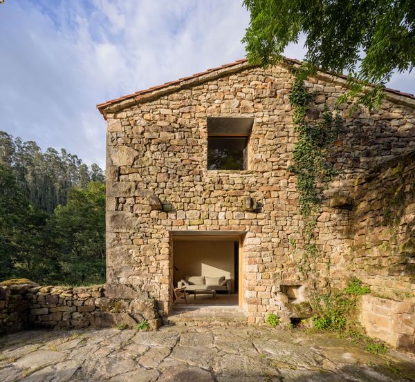 A New Envelope Turns This Old Stone Stable in Spain Into a High-Performing Home