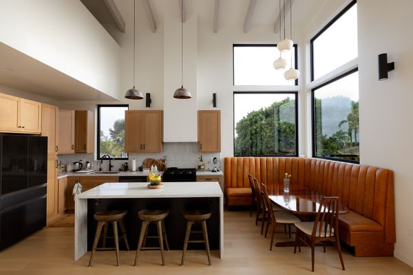 Sarah and Brant Barrah combined off-the-shelf elements like quartzite counters and oak cabinets with glazed ceramic ARTO "Kozo