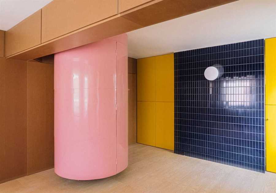 A Pink Stair Punctuates a Family’s Renovated 720-Square-Foot Madrid Apartment