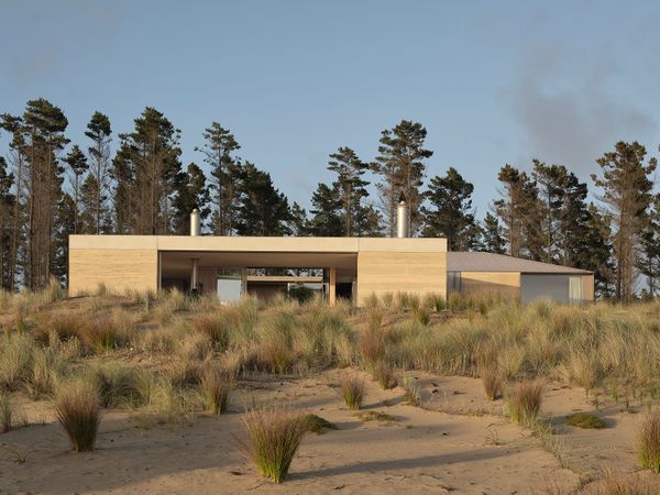 Floor-to-Ceiling Glass Sliders Peel Back Entire Walls at This Rammed Earth Home in New Zealand