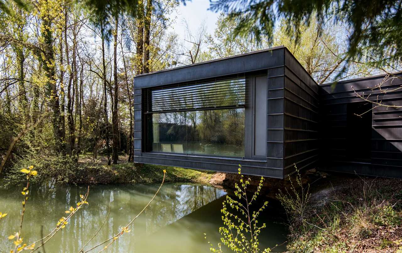 Seeking €820K, This Serpentine Home Is Perched Above a Pond in Southern France