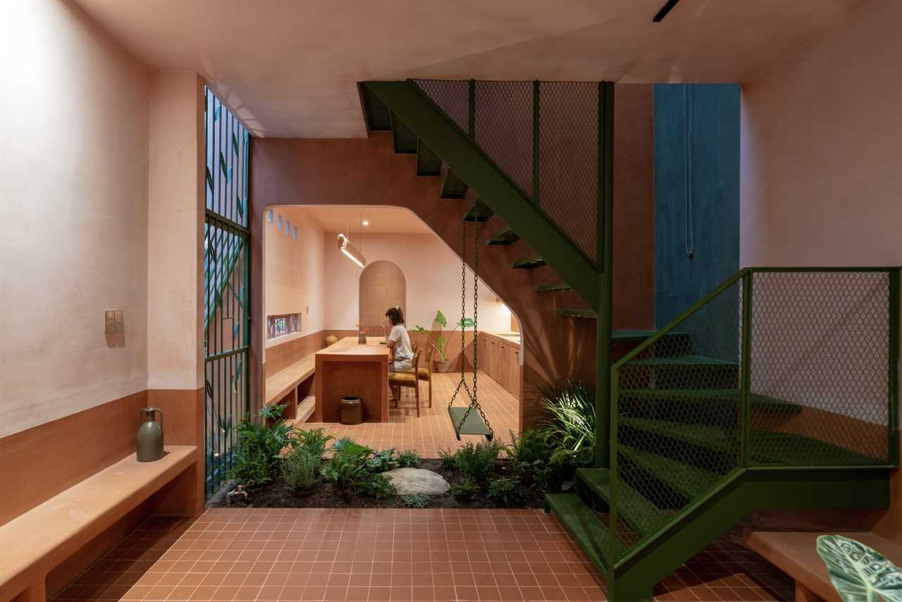 Wall-to-Wall Clay—Including Animal-Shaped Doorknobs—Recasts This Vietnamese Tube House