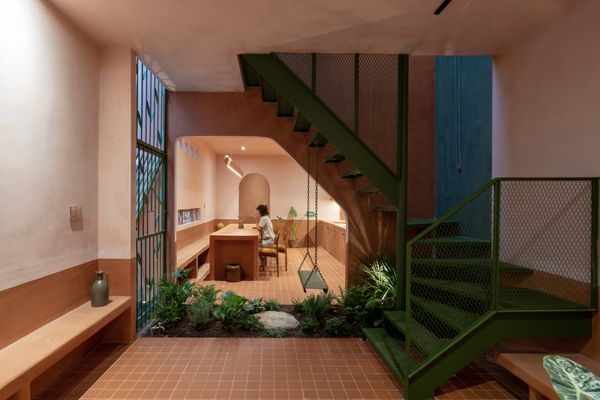 Wall-to-Wall Clay—Including Animal-Shaped Doorknobs—Recasts This Vietnamese Tube House