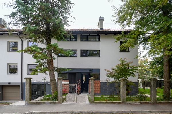 In Slovenia, Two 1950s Terrace Homes Trade Tiny Rooms for Light-Filled Vertical Layouts