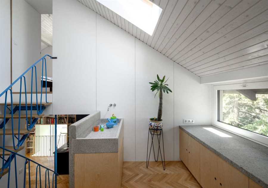 In Slovenia, Two 1950s Terrace Homes Trade Tiny Rooms for Light-Filled Vertical Layouts