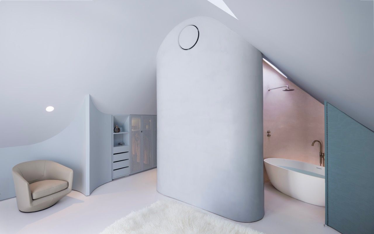 How They Pulled It Off: A Cramped Attic Becomes a Curvy, Pastel-Toned Primary Suite