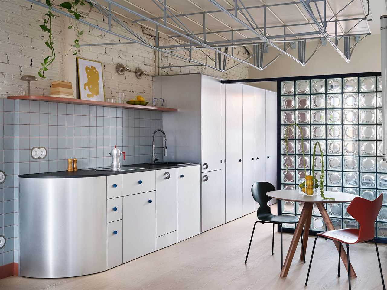 The Loft in This Madrid Flat Hangs From the Ceiling With a Metal Truss