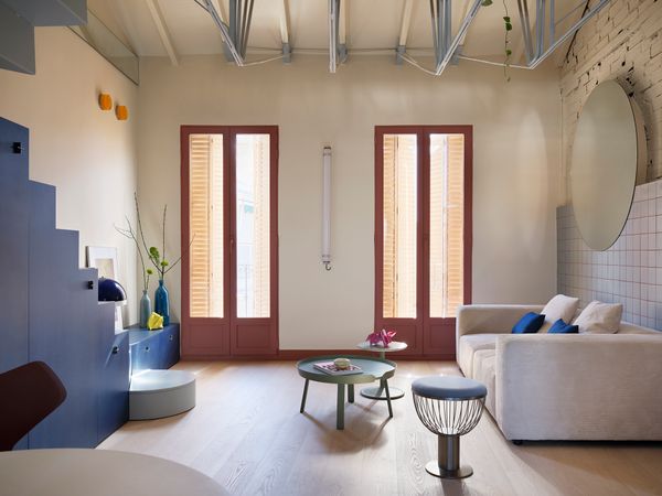 The Loft in This Madrid Flat Hangs From the Ceiling With a Metal Truss