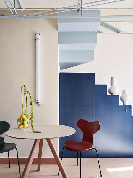 The Loft in This Madrid Flat Hangs From the Ceiling With a Metal Truss