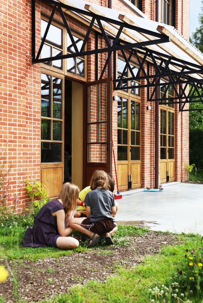 The Interior of This Brick Home in Belgium Takes an Unexpected Turn