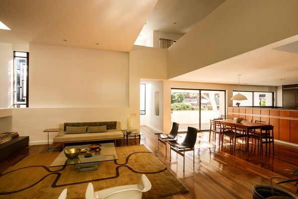 The ground floor's ceilings reach 14 feet high.