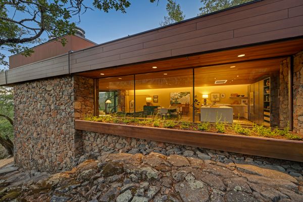 In Northern California, an Architect’s Stone-Clad $3M Home Brings the Hillside Inside