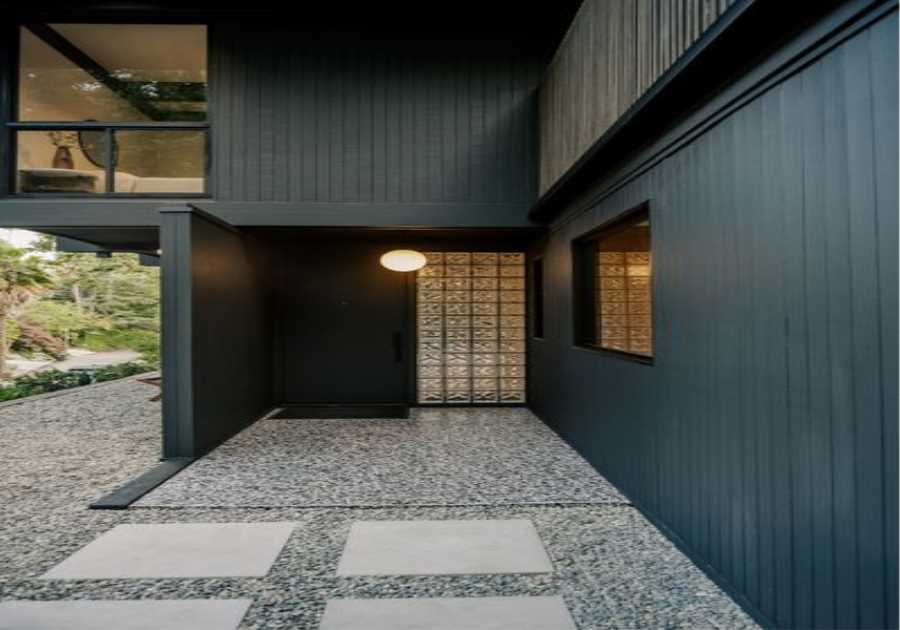 This $2.8M L.A. Midcentury Has an Ink-Black Facade and Bright-White Interiors