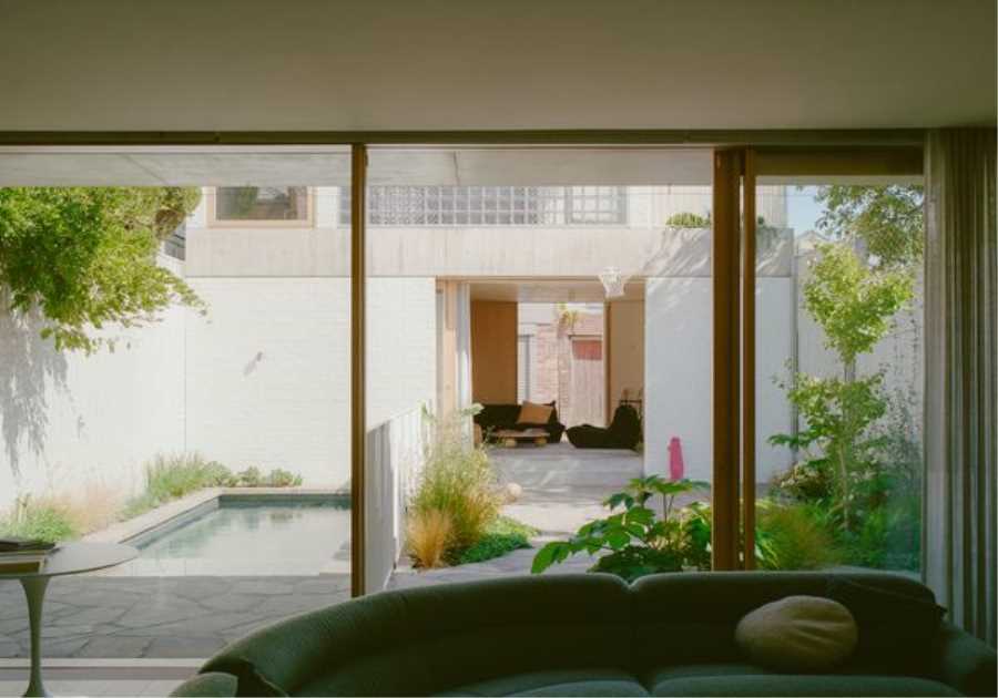 It’s Made From Glass Bricks, But Their Backyard Studio Is Anything But ’80s