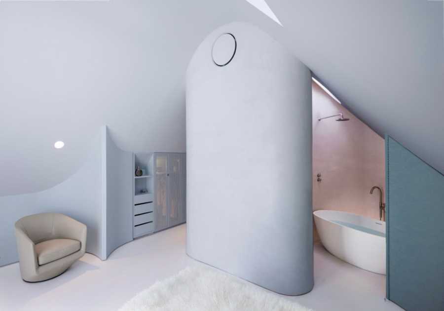 How They Pulled It Off: A Cramped Attic Becomes a Curvy, Pastel-Toned Primary Suite