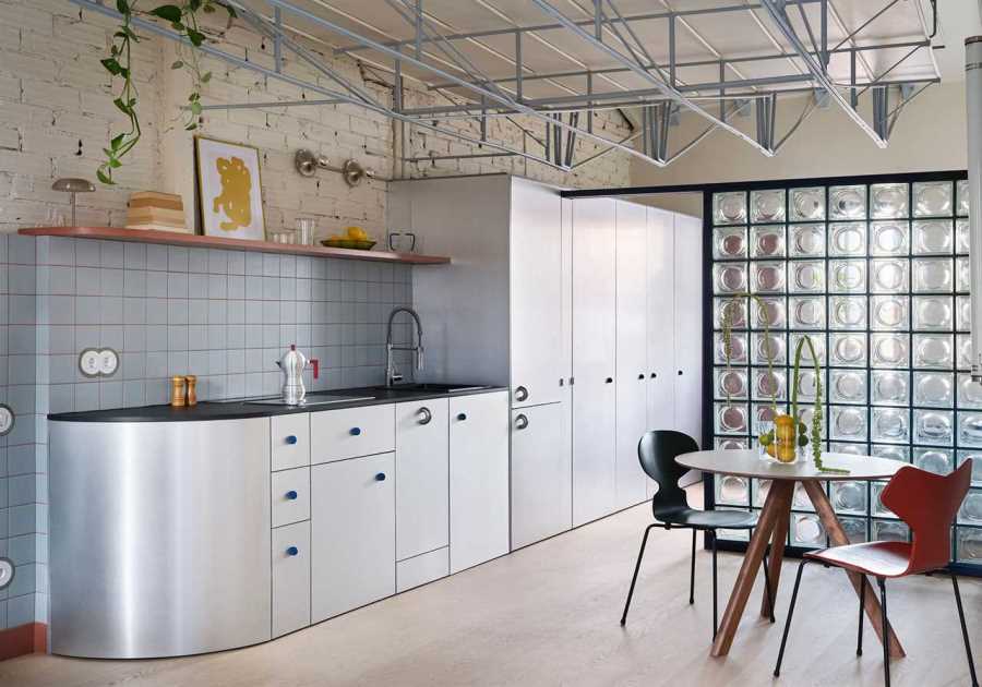 The Loft in This Madrid Flat Hangs From the Ceiling With a Metal Truss